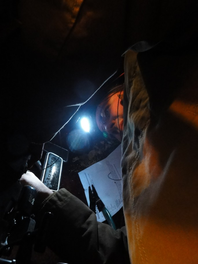 Reaching a tight wiring spot behind the dash during the GM Passkey bypass install