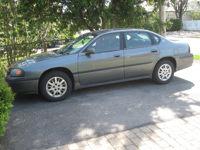 Stephan Saranczuk's gray Chevrolet Impala sedan parked on an asphalt driveway