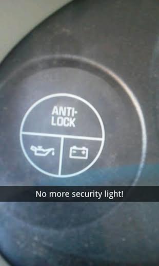 Close-up of the dashboard warning light cluster in Scott Lawrence's Buick Century, with no security light illuminated after the NEWROCKIES PRO Module install