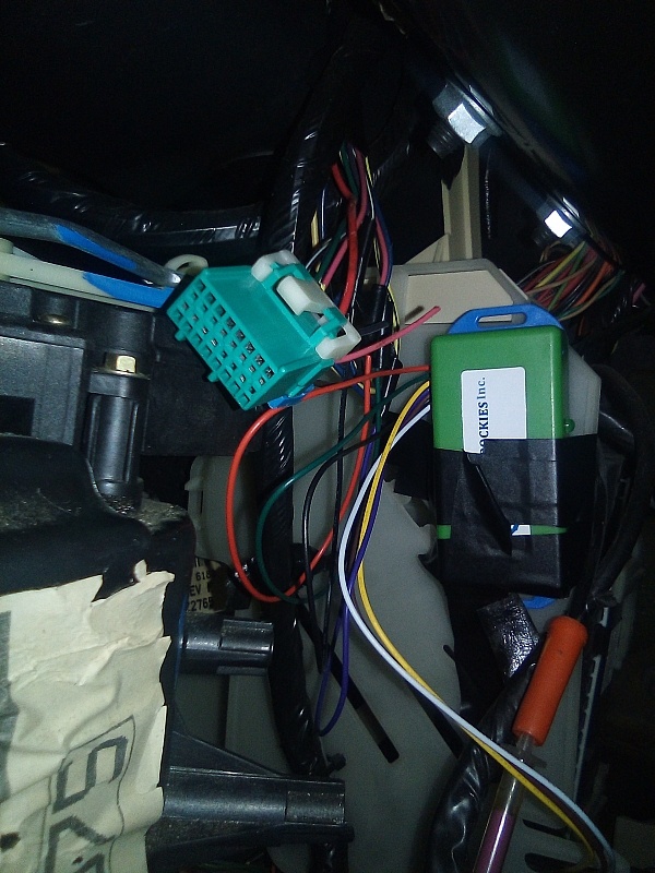 The NEWROCKIES PRO Module wired into the TDM harness of Regina's 1997 Oldsmobile 88, permanently bypassing the GM Passlock/PASS-Key anti-theft system