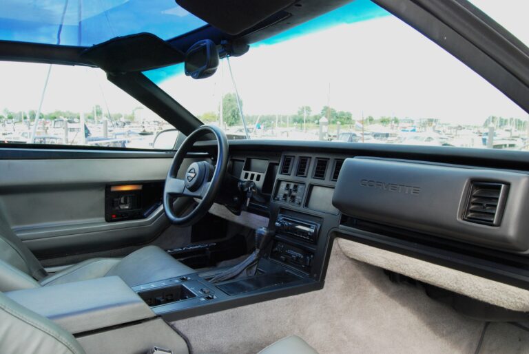 Dashboard and interior of a 1986 Chevrolet Corvette C4, behind which the VATS theft deterrent module is mounted