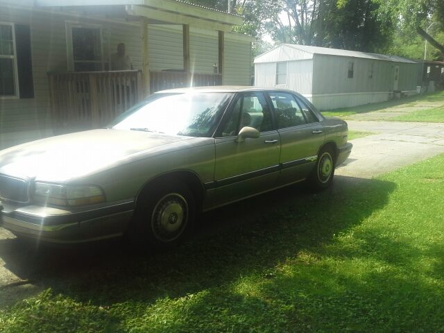 The Buick LeSabre parked on the grass