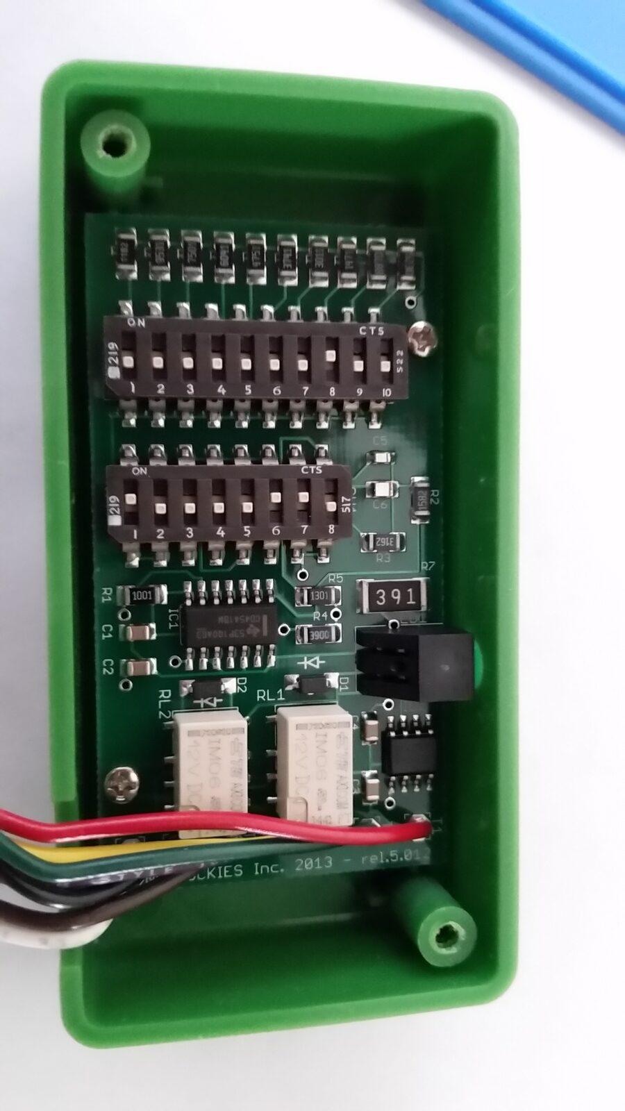 The open PRO Module enclosure showing the circuit board and dip switch banks George documented
