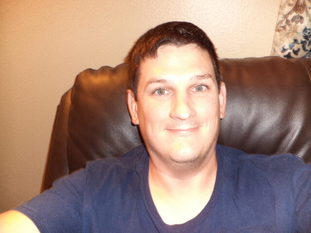 Matthew smiling after the Silverado install