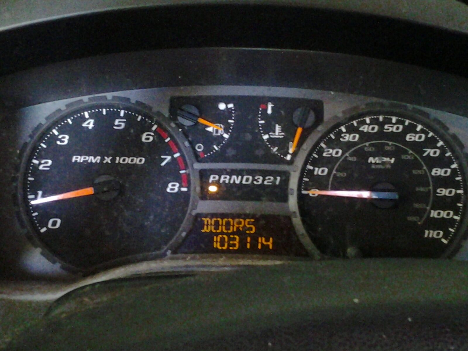 The Colorado instrument cluster running after the install, odometer at 103,114